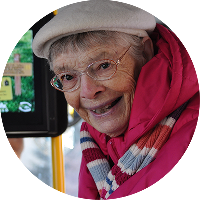 Photo of an older woman, Roberta, smiling at the camera.