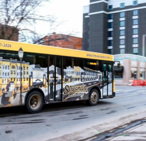 Photo of one of the Streamline buses driving by.